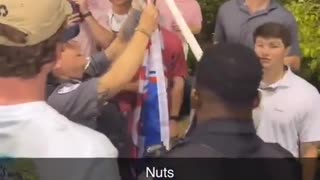 University of Arkansas Police cut down a pro-Trump flag at a baseball game