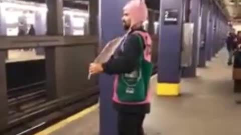 Guy subway with fart sign and pooping pink shirt