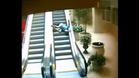 Fuhrer Joe Biden using the Escalator