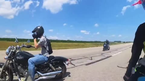 Motorcyclists Share Gummy Worms