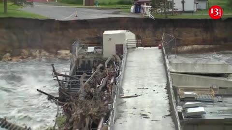 Moment of collapsing of house into river near Rapidan Dam in southern Minnesota