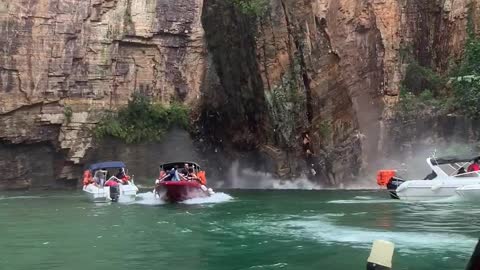 Rock Formation Falls on Boating Tourists