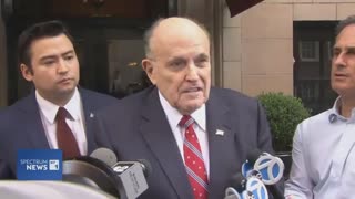 Rudy Giuliani speaks to reporters in Manhattan before flying to Georgia this morning for...
