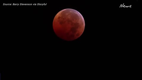 Moon shines blood red in total lunar eclipse