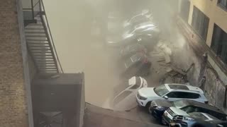 Another angle of parking garage collapse