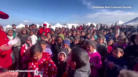 Video shows children singing in Gaza camp with Red Crescent