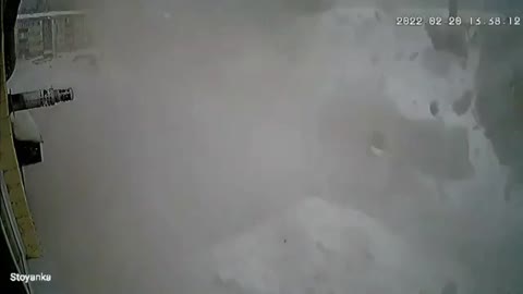 A woman and a child were almost covered with snow