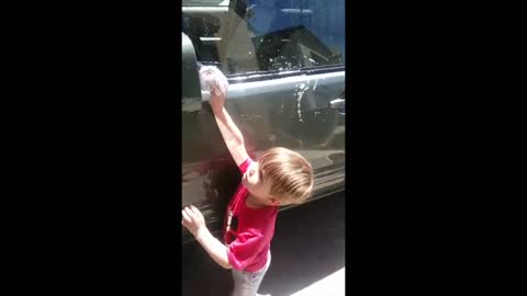 2 Year Old Levon sings Hard Knock life Washing the Car 😂