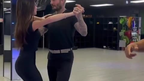 David and Victoria Beckham take a salsa dancing lesson together