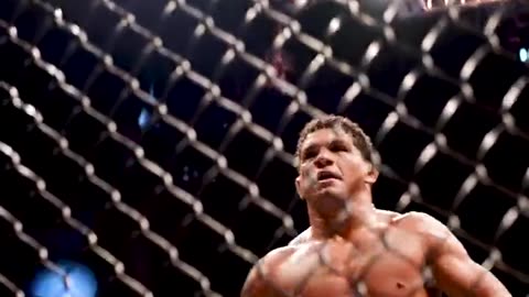 Cage side view of Gilbert Burns tapping Neil Magny