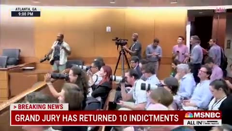 The judge in Georgia is cracking jokes to the journalists in the room