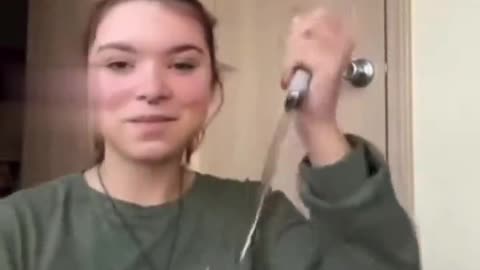 Girl slices forehead with knife - Tiktok trend