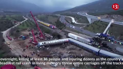 Drone views of Greece train collision site at dusk
