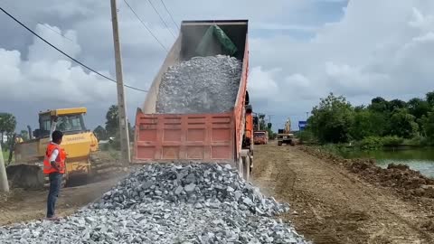New bulldozer spreading gravel processing features building road foundation-10