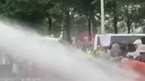 Climate Activists get BLASTED with Water in Netherlands by FIRE TRUCKS!