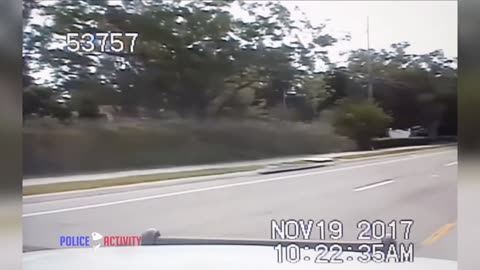 Police Dashcam Captures Small Plane Crashing Onto Florida Road