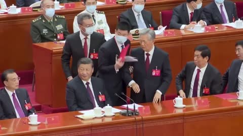 Former Chinese president Hu Jintao escorted out of Communist Party Congress