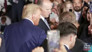 Trump is introduced as "the next President of the United States" as he enters the room at Mar-a-Lago