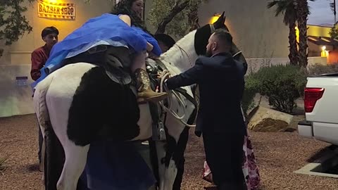 Quinceañera gets on a Horse