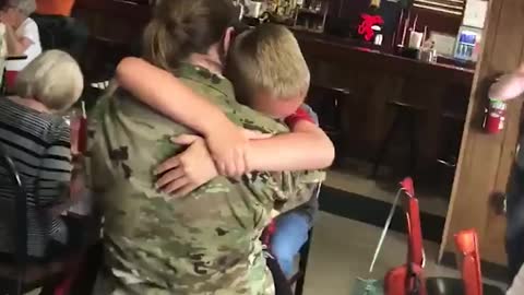 Kids welcoming their Miltary Parents