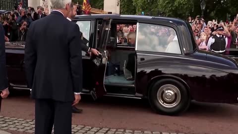 King Charles greets crowds at Buckingham Palace