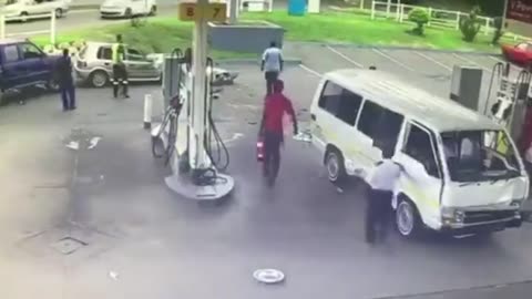 Moment out of control vehicle crashes into petrol station