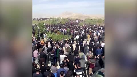 Thousands gather at Iran cemetery where Amini lies