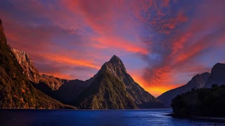Sunset Over Mountain With Looping Clouds And Water (No Copyright)