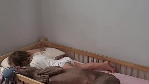 Kid Takes a Nap With Dog