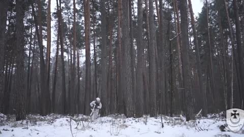 Ukrainian Troops Show Off Sleek White Winter Camo Gear Hiding In Snowy Forest