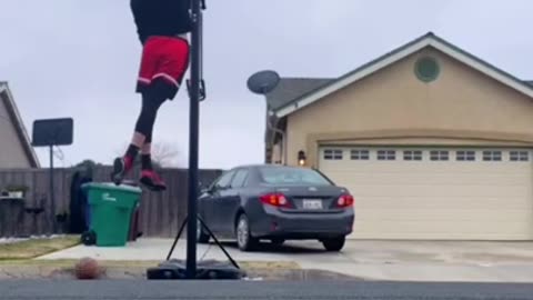 Dunking on a 9'10 rim