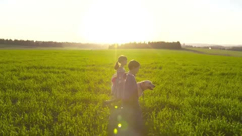 children walking with a dog