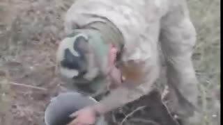 Ukraine soldiers dig for potatoes to eat