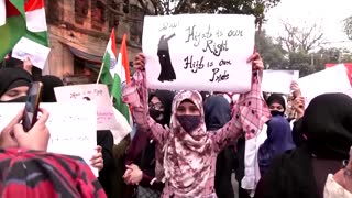 Indian police detain hijab ban protesters