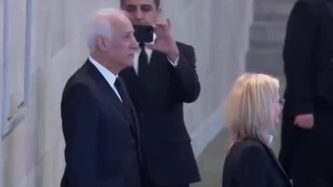 Armenian president takes picture in front of Queen's coffin