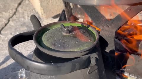 cooking stuffed salmon in an Iranian village