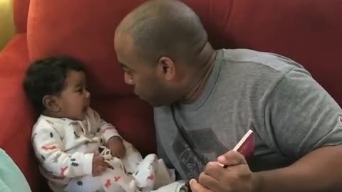 Sweet Baby Can't Stop Giggling When Dad Reads Stories