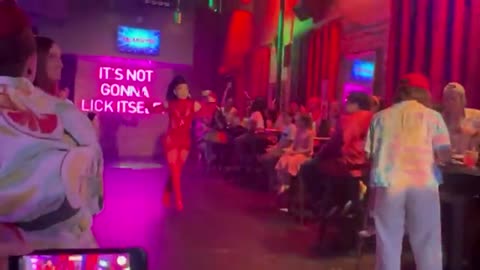 Drag Queen In Dallas Gay Bar Dances In Front Young Child After Taking Money