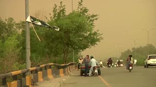 Dust storm, rain bring respite from heat to Islamabad