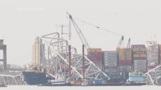 Floating crane arrives at wreckage of Baltimore's collapsed bridge