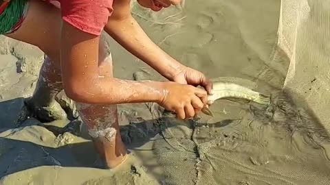 Fishing on the river bank