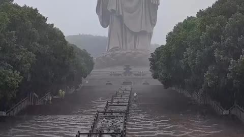 Standing in awe at the Wuxi Giant Buddha