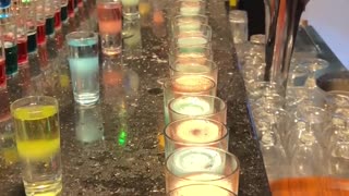 Rows of Colorful Drinks Expertly Mixed