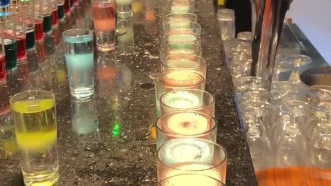 Rows of Colorful Drinks Expertly Mixed