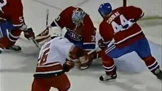 Craig Rivet (Canadiens) FIGHTS Andrew Ladd (Hurricanes)