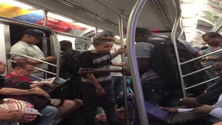 Talented Kid Sings Beautifully On A Subway Train In NYC