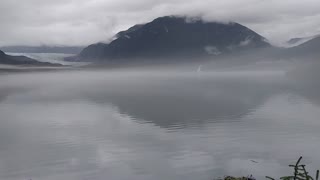 Breathtaking Mist and Fog Over Alaska Lake