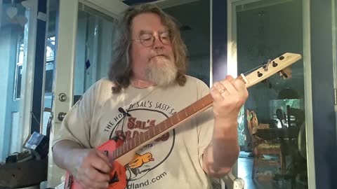 Again Room Electric Cigar Box Guitar by D-Art Homemade Guitar Co.