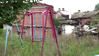 'Z'-marked tanks stand abandoned in retaken Ukrainian town