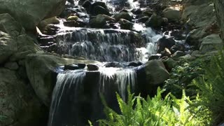 small waterfall on a rocky mountain